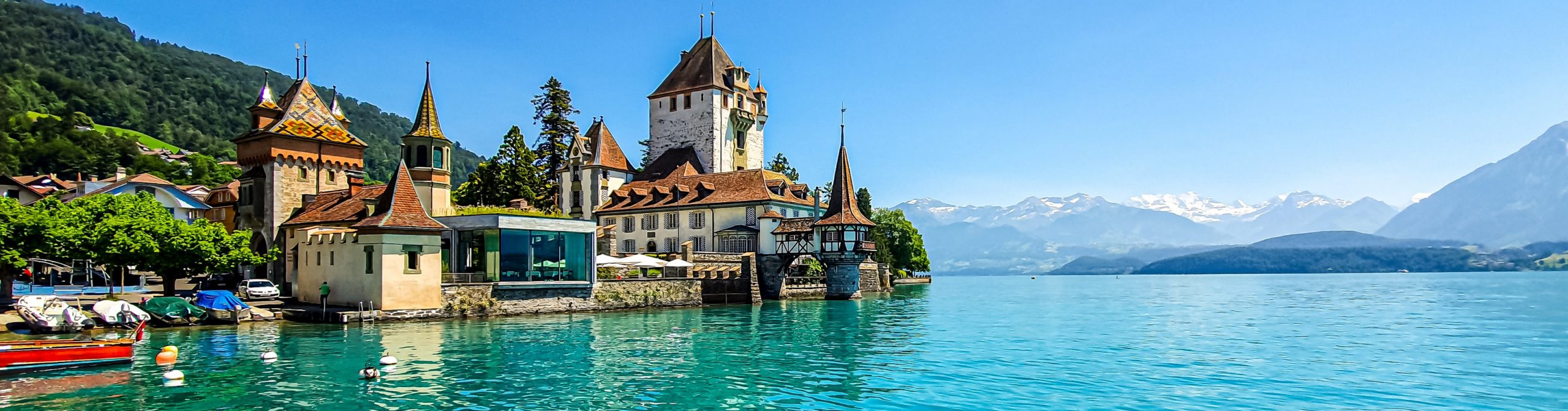 Swiss housing on the lake with mountains in switzerland