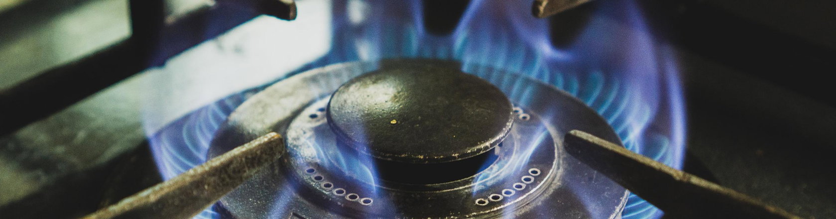 Blue flames from gas stove burner
