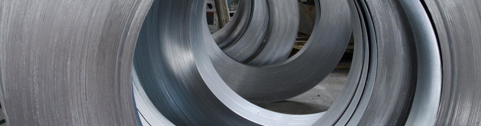 Rolls of nickel sheet inside the factory or warehouse.