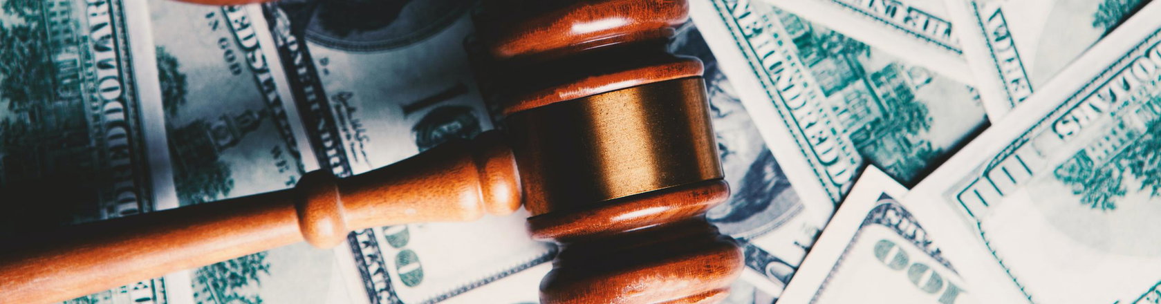 Money and a judge hammer